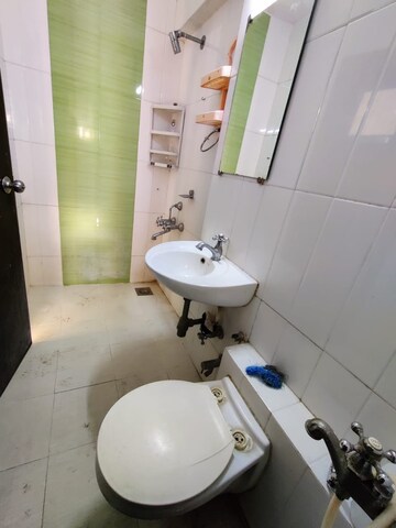 Bathroom in 2 BHK Apartment at Tulsibaug CHS, Borivali West – for Rent