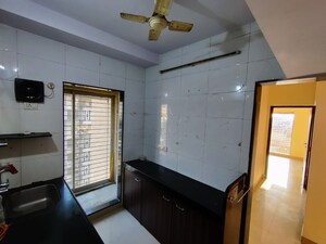 Living Room in 2 BHK Apartment at Tulsibaug CHS, Borivali West – for Rent