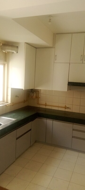 Kitchen in 3 BHK Apartment at Shree Vardhman Gardenia, Sector 10 – for Sale