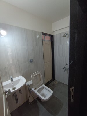 Bathroom in 2 BHK Apartment at Vihang Valley Phase 2, Kasarvadavali – for Rent