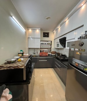 Kitchen in 3 BHK Apartment at Bhagwan Nagar – for Sale