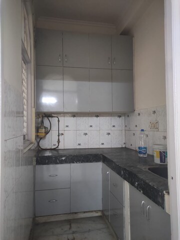 Kitchen in 1.5 BHK Builder Floor at Vasundhara Sector 2b – for Sale