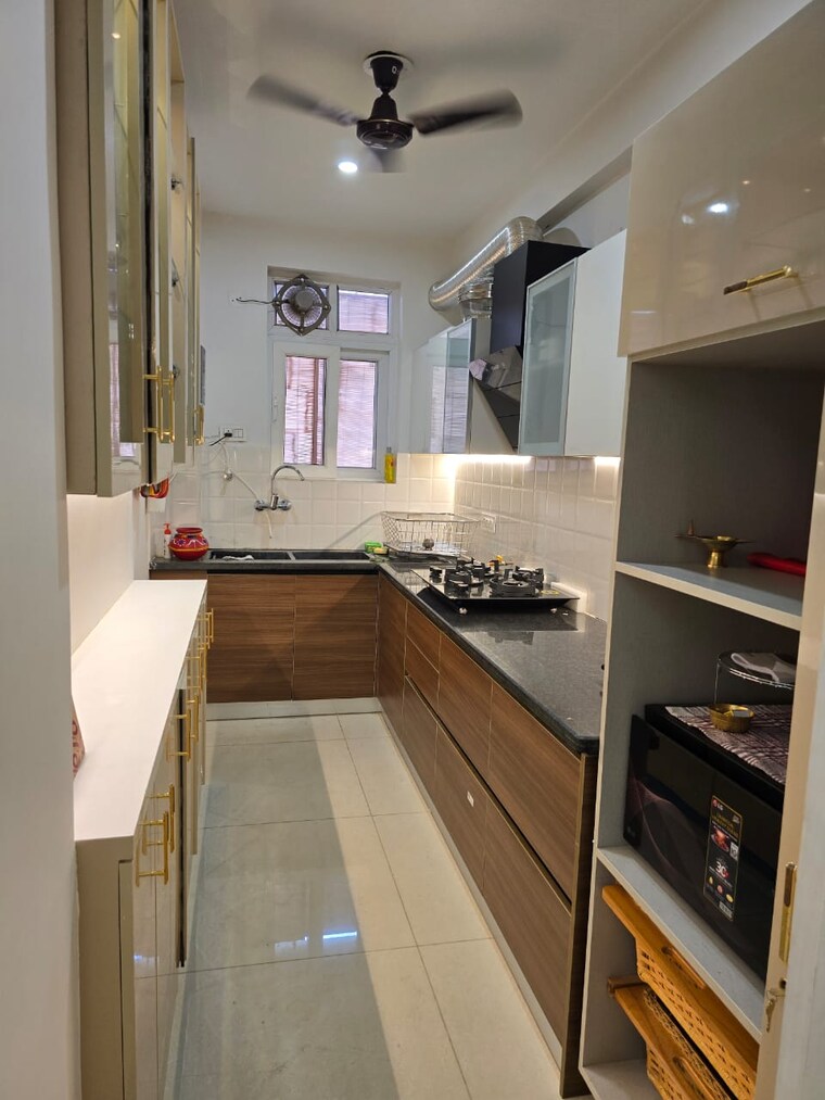 Kitchen, maxxus-elanza 3 Bedroom 1550 Sq.Ft. Apartment In International Airport Road Zirakpur 9544482