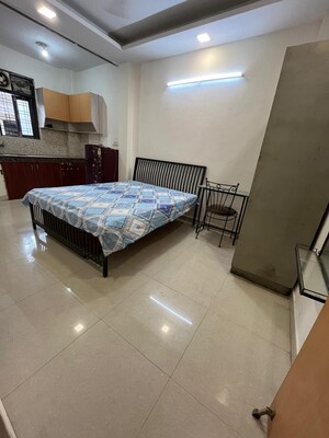 Bedroom in 1 RK Builder Floor at Ansal Sushant Lok I, Sector 43 – for Rent