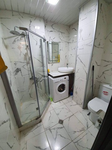 Bathroom in 3 BHK Builder Floor at Sector 16c Greater Noida – for Rent