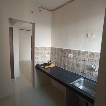 Kitchen in 1 BHK Apartment at Dosti Greater Thane, Purna – for Rent