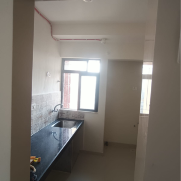 Building Lobby in 1 BHK Apartment at Dosti Greater Thane, Purna – for Rent
