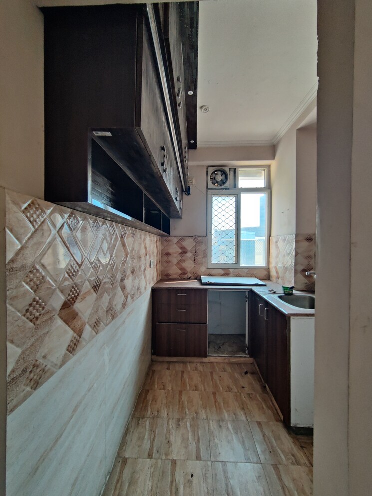 Kitchen, amrapali-golf-homes 2.5 Bedroom 945 Sq.Ft. Apartment In Sector 4 Greater Noida Greater Noida 9544948