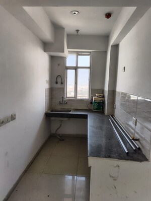 Kitchen in 2.5 BHK Apartment at Ajnara Homes, Sector 16b Greater Noida – for Sale