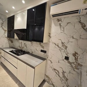 Kitchen in 4 BHK Builder Floor at Wave City Center, Sector 32 – for Sale