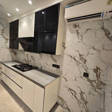 Kitchen in 4 BHK Builder Floor at Wave City Center, Sector 32 – for Sale