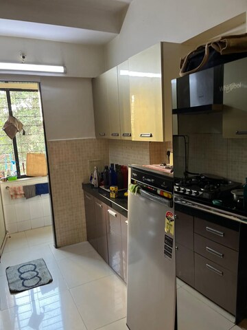 Kitchen in 1 BHK Apartment at VR Bhoomi Acres G Wing, Ghodbunder Road – for Rent