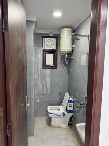 Bathroom in 2 BHK Builder Floor at Chattarpur – for Rent