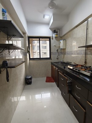 Kitchen in 1 BHK Apartment at K Raheja Palm Spring, Malad West – for Rent