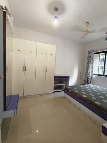 Bedroom in 1 BHK Apartment at K Raheja Palm Spring, Malad West – for Rent