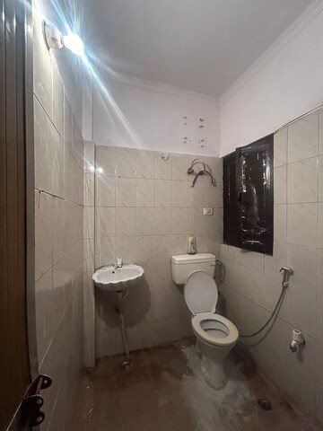 Bathroom in 2 BHK Builder Floor at Chattarpur – for Rent