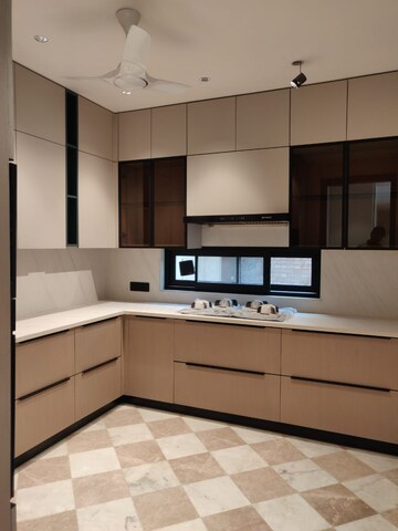 Kitchen in 4 BHK Builder Floor at Auram Floor, South City 2 – for Sale