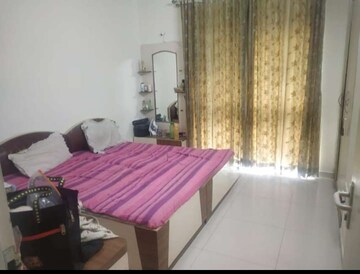 Bedroom in 2 BHK Apartment at Sheth Vasant Lawns, Laxmi Nagar – for Rent