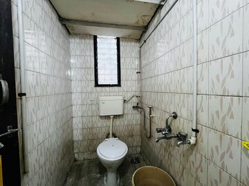 Bathroom in 1 BHK Apartment at Wadgaon Sheri – for Rent