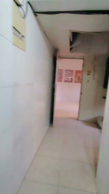 Room in 2 BHK Apartment at Lokhandwala Vinay Tower, Kandivali East – for Sale