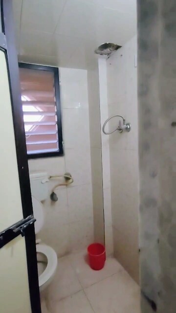 Bathroom in 2 BHK Apartment at Lokhandwala Vinay Tower, Kandivali East – for Sale