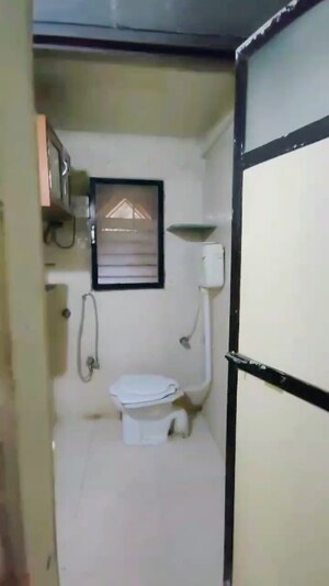 Bathroom in 2 BHK Apartment at Lokhandwala Vinay Tower, Kandivali East – for Sale