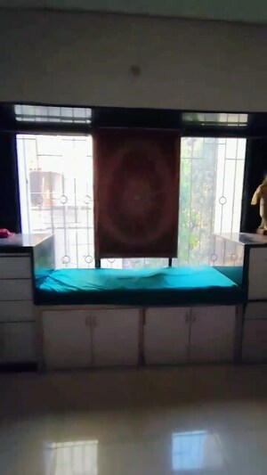 Bedroom in 2 BHK Apartment at Lokhandwala Vinay Tower, Kandivali East – for Sale