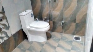 Bathroom in 2 BHK Apartment at Sai Dishti CHS, Ravet – for Rent