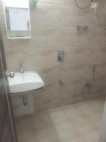 Bathroom in 3 BHK Apartment at Mira Nagar – for Sale