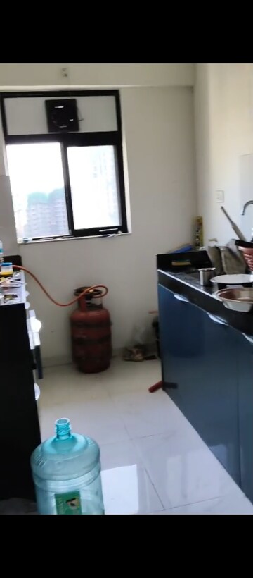 Master Bedroom in 1 BHK Apartment at Runwal Gardens, Dombivli East – for Rent