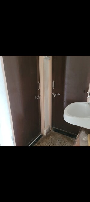 Bathroom in 2 BHK Apartment at Leela Park CHS, Anand Nagar – for Rent