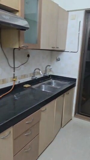 Kitchen in 2 BHK Apartment at Riddhi Tower, Malad East – for Rent