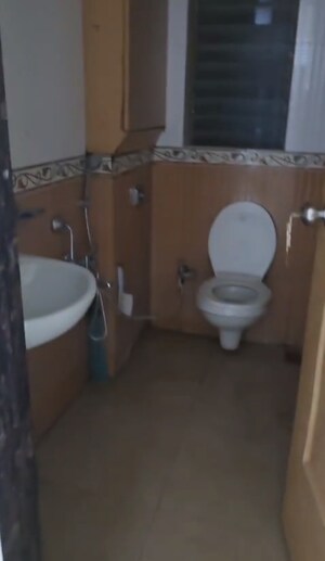 Bathroom in 2 BHK Apartment at Riddhi Tower, Malad East – for Rent