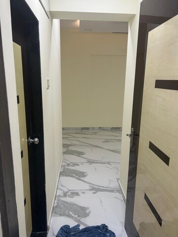 Staircase in 2 BHK Apartment at RNA N G Silver Spring, Mira Road – for Rent