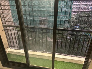 Balcony in 2 BHK Apartment at RNA N G Silver Spring, Mira Road – for Rent