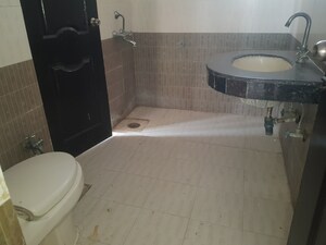 Bathroom in 2 BHK Apartment at Ramprastha Pearl Court, Vaishali Sector 7 – for Rent