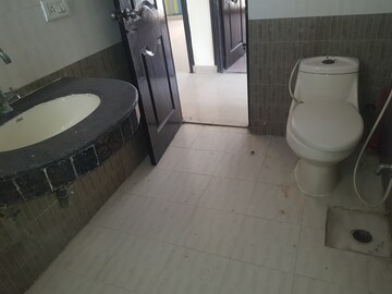 Bathroom in 2 BHK Apartment at Ramprastha Pearl Court, Vaishali Sector 7 – for Rent