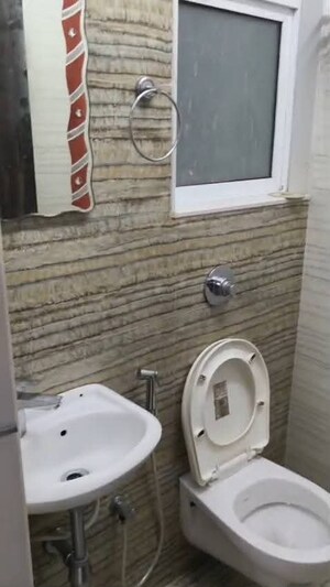 Bathroom in 2 BHK Apartment at Andheri West – for Rent