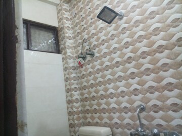 Bathroom in 1.5 BHK Builder Floor at Mayur Vihar – for Rent