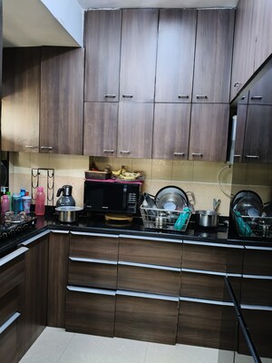 Kitchen in 2 BHK Apartment at Eden Woods complex, Manpada – for Sale