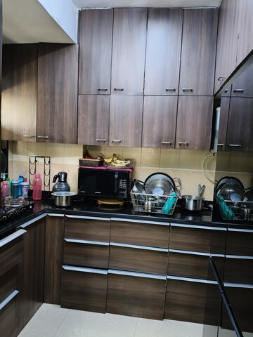 Kitchen in 2 BHK Apartment at Eden Woods complex, Manpada – for Sale