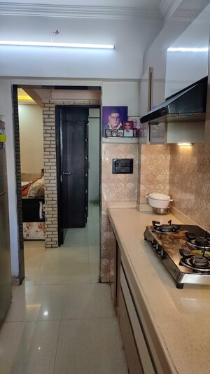 Kitchen in 2 BHK Apartment at Hill Palace CHS Ltd, Pokhran Road No One – for Sale