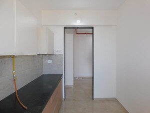Kitchen in 2 BHK Apartment at MICL Aaradhya Parkwood, Mira Road – for Rent
