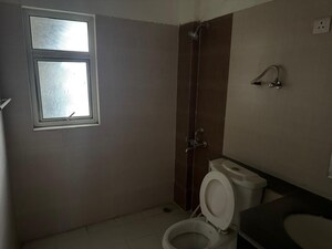 Bathroom in 3 BHK Apartment at Raheja Sampada, Sector 92 – for Rent