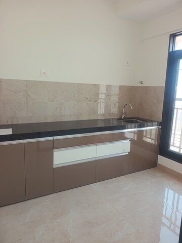 Kitchen in 2 BHK Apartment at MICL Aaradhya Highpark, Mira Road – for Rent