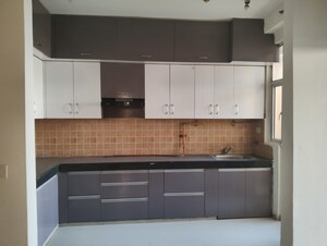 Kitchen in 3 BHK Apartment at Mahagun Mywoods, Sector 16c Greater Noida – for Rent