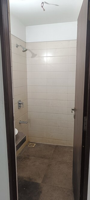 Bathroom in 1 BHK Apartment at Akshar Edeania, Dronagiri – for Rent