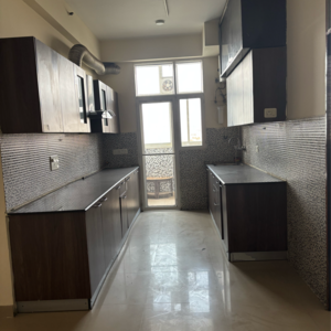 Kitchen in 3.5 BHK Apartment at JM Aroma, Sector 75 – for Rent
