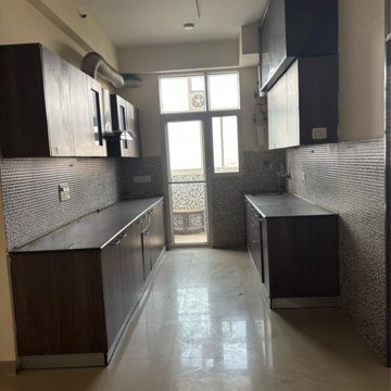 Kitchen in 3.5 BHK Apartment at JM Aroma, Sector 75 – for Rent