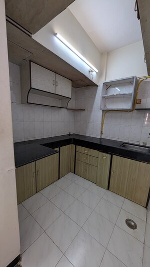 Kitchen in 1 BHK Apartment at Dheeraj Kirti, Malad West – for Rent